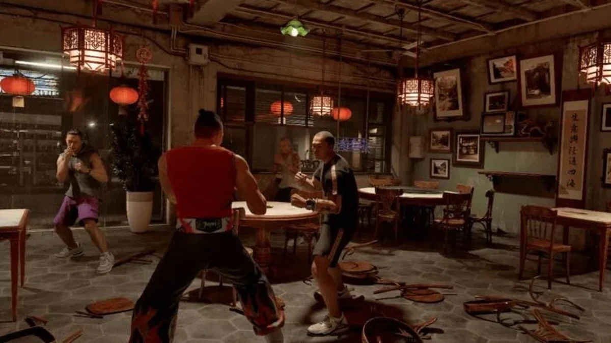 Personagens de Virtua Fighter Crossroads em combate nas ruas de Vilasapara, cidade fictícia do Sudeste Asiático